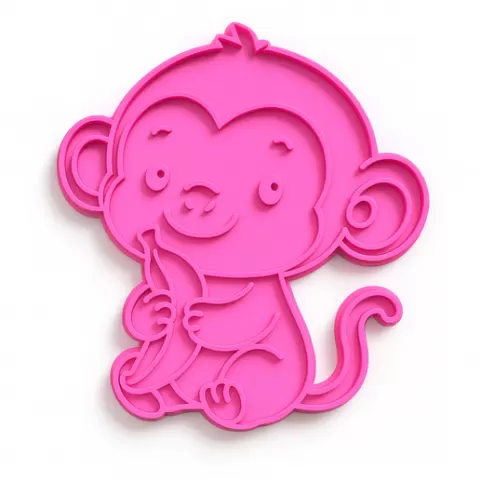 Little monkey eating cookie cutter