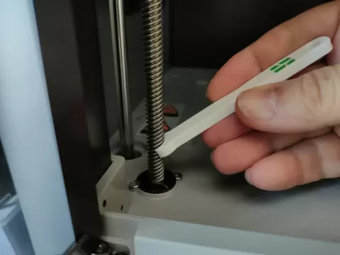 Grease tool for z axis road