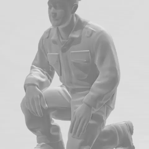 Kneeling Marine Technician