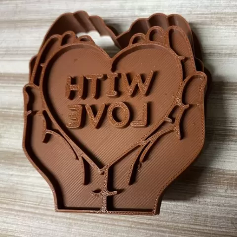 Heart in hands "with love"