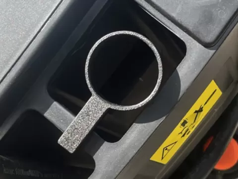 Pressure wash nozzle holder