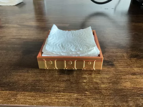 Nozzle cleaning paper towel holder