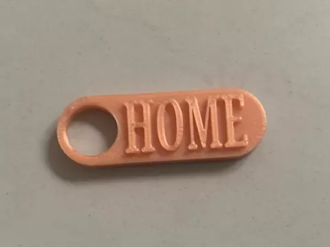 Keychain with " HOME " Titel