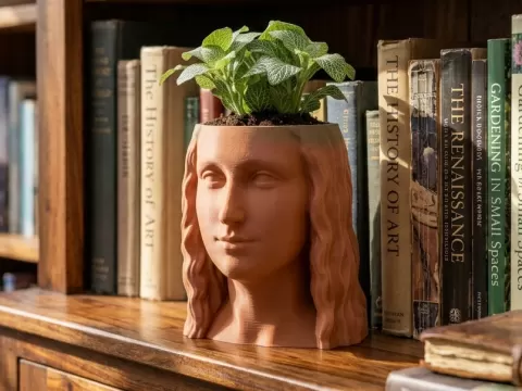 Sculpture of Mona Lisa planter or desc organiser