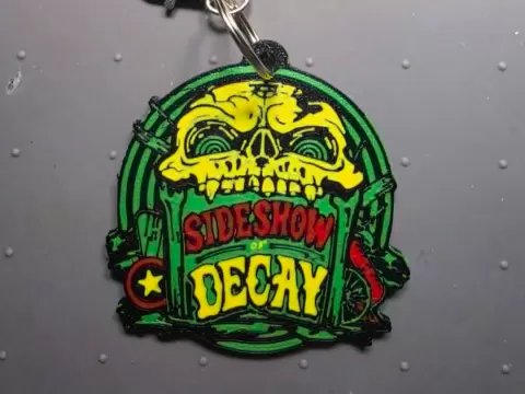 HHN 35 2026 Sideshow of Decay Scare Zone Keychain