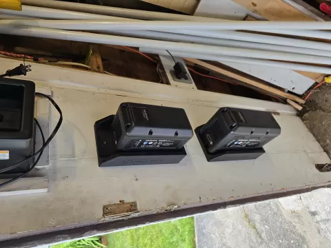 Hond* lawn mower battery holder