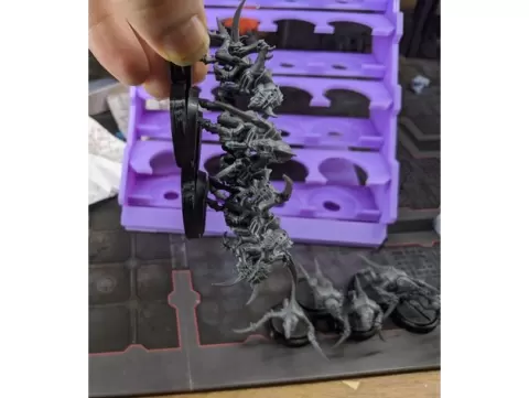 Movement trays with better retention