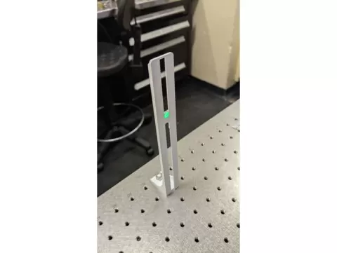 Self-aligning laser alignment tool