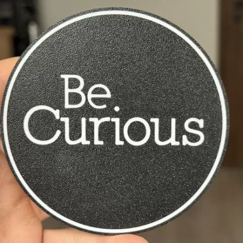 Be Curious coaster