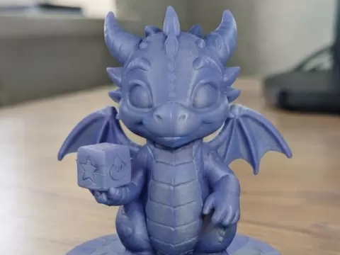 Adorable Baby Dragon with Magic Cube