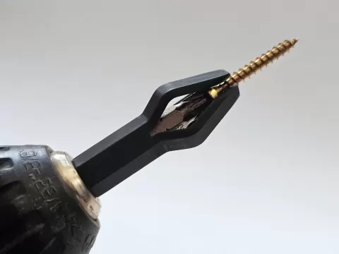Auto-Releasing Screw Holder