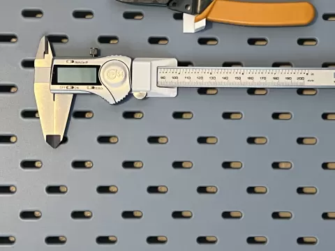 SKADIS Caliper Holder