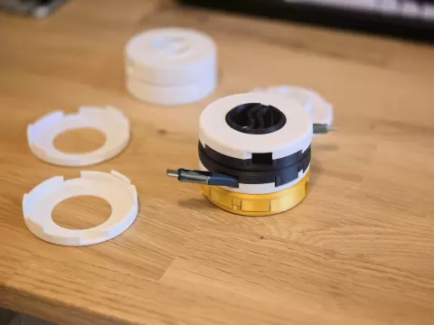 Parametric stackable cable organizer / winder (one-way or two-way winding) with FreeCAD files