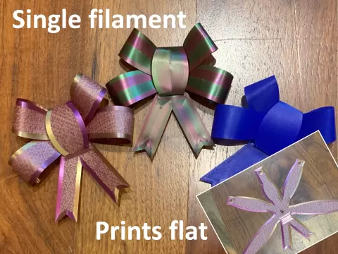 Folding gift bow