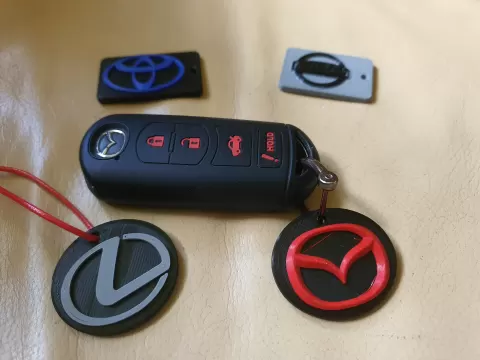Keychain with logo. Acura, BAIC, Buick, BYD, Cadillac, Chery, Chevrolet, Dodge, Ford, GMC, for Honda, Hyundai, Infiniti, Isuzu, Jaecoo, Jeep, KIA, Lexus, Lincoln, Mazda, MG, Mitsubishi, Nissan, Omoda, RAM, Subaru, Suzuki, Tesla, Toyota.