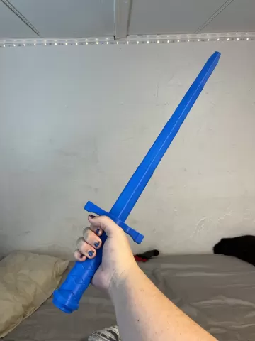 collapsible sword with replaceable blade
