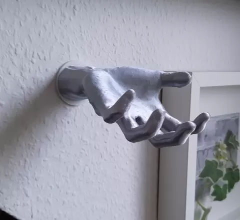 Wall-mounted hand