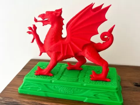 welsh dragon on a green intricate base