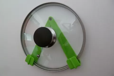 Pot lid holder - adjustable