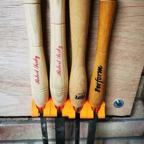 Lathe wall mounted chisel holder