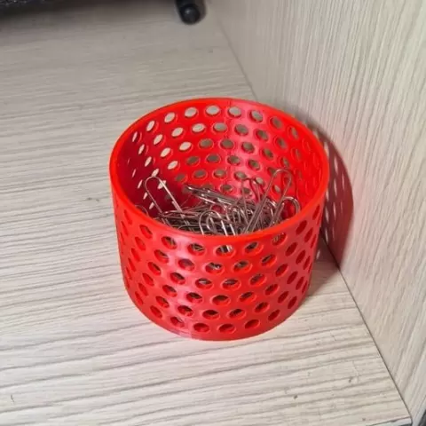 Small desk basket for paper clips, staples, tacks, etc. Additional pencil holder basket of the same design is included.