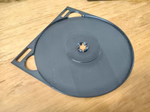 Optical disc swing tray insert for DVD and Bluray cases.