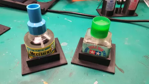 Dual compatible Tamiya & Mr Cement (2025+ Round bottle) cement holder.