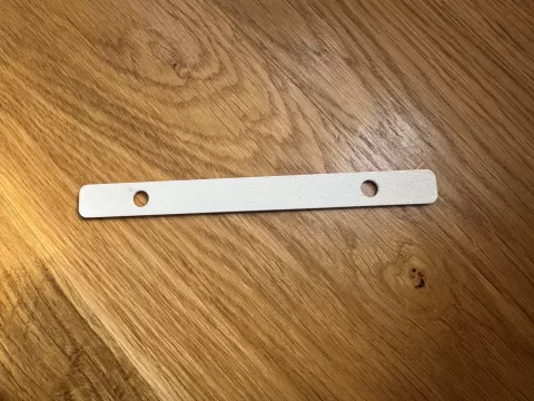 Minimalist filing bracket / stapler cover strip