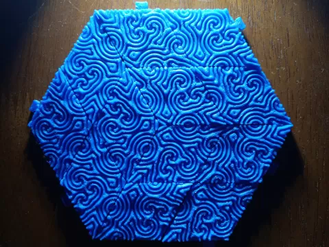 Rhombus tiles with seamless spiral texture