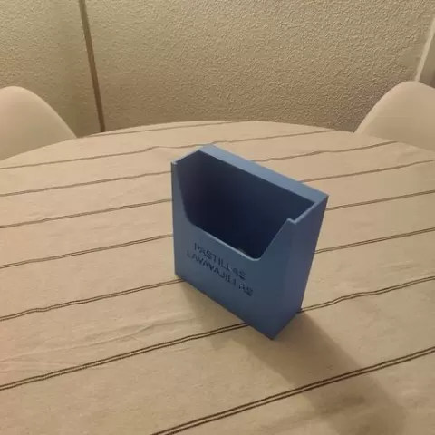 Dishwasher tablet container