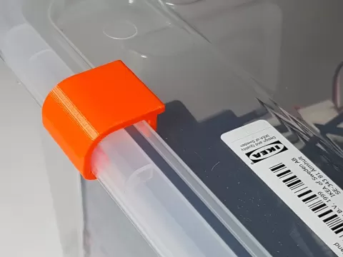 Clip for IKEA Samla boxes (presses lid on, for a tight seal)