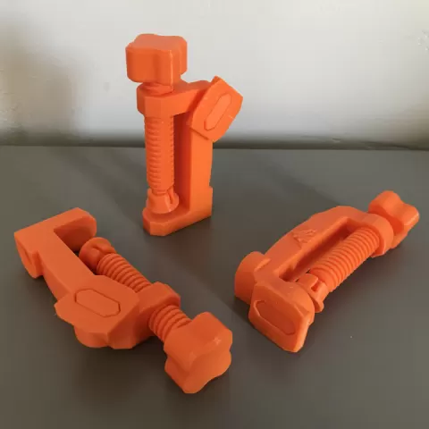 Tiny Car Track Clamp by James M. Drachenberg
