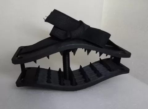 Spiked elastic strap crusher - Indice89