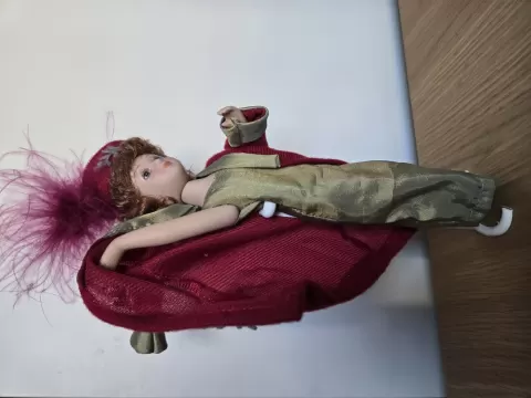 Porcelain doll display stand