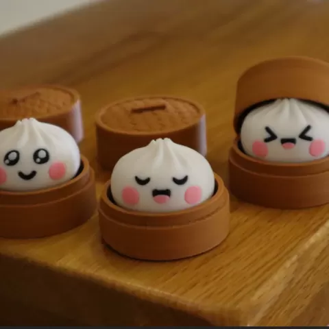 Dumpling Clicker (3 faces and box) by Myron