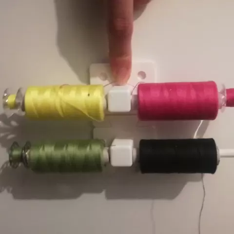 Custom bobbin holder by Tim Kilson