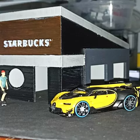 Small simple Starbucks by Rafael Lino
