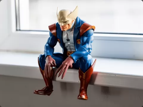 Wolverine sitting figurine