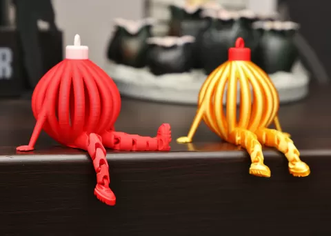 Christmas ornament with articulated legs