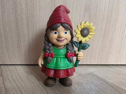 Gartenzwerg-Mädchen mit Sonnenblume