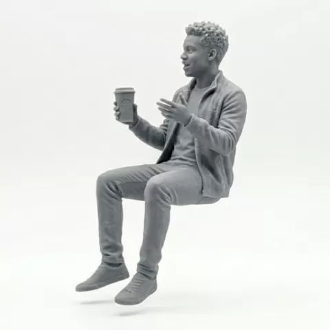 Guy Sitting drinking coffee
