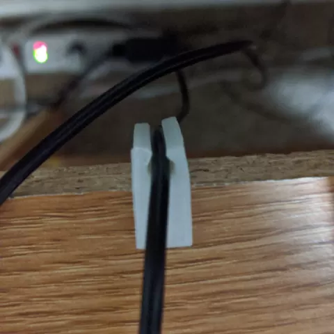 Improved Charging Cord Holder by Ebug14