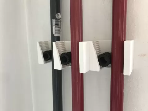 Triple & quadruple gravity broom holder + gear for smaller diameter broom sticks