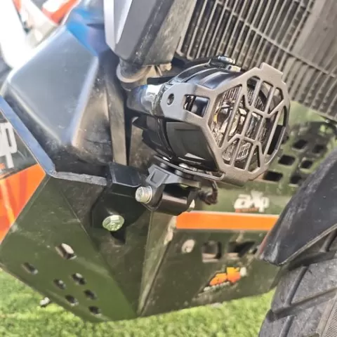 Motorcycle headlight mounting adapter