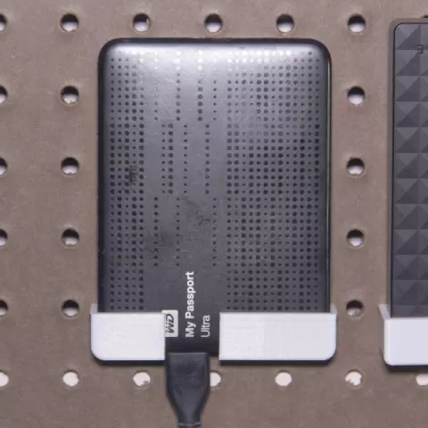 Peg Anything // WD My Passport Ultra 1TB (old model) Holder by Devin Enrique Büchele de Montes