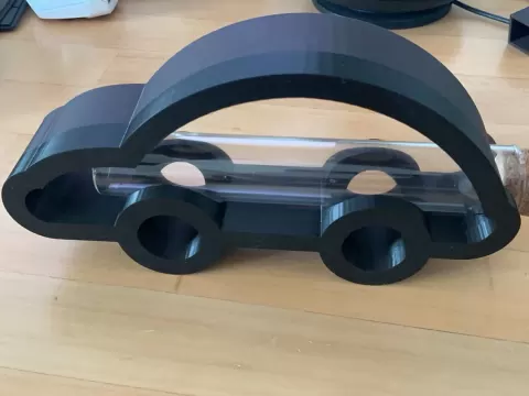 Auto Silhouette mit Reagenzglas als Geschenk