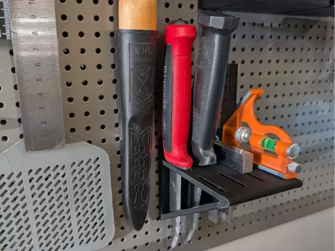 Pegboard holder for combination squares and knives