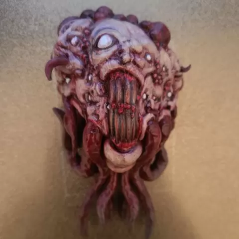 Fleshy horror fridge magnet