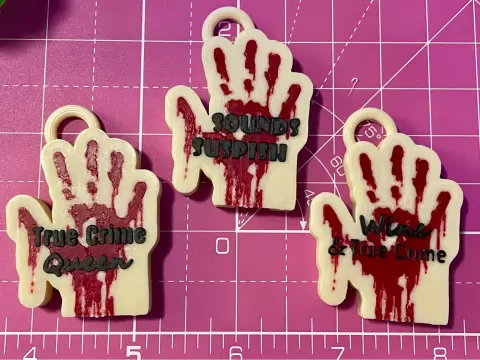True Crime keychains & straw topper