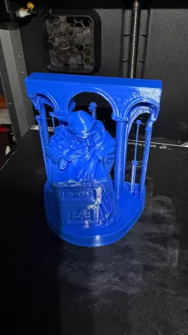 Mystery Fun House Wizard behind Podium